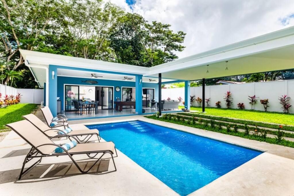 an image of a swimming pool in a house at Casa Emma - Oasis Playa Potrero in Playa Flamingo