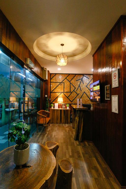 Posezení v ubytování Anggun Hotel