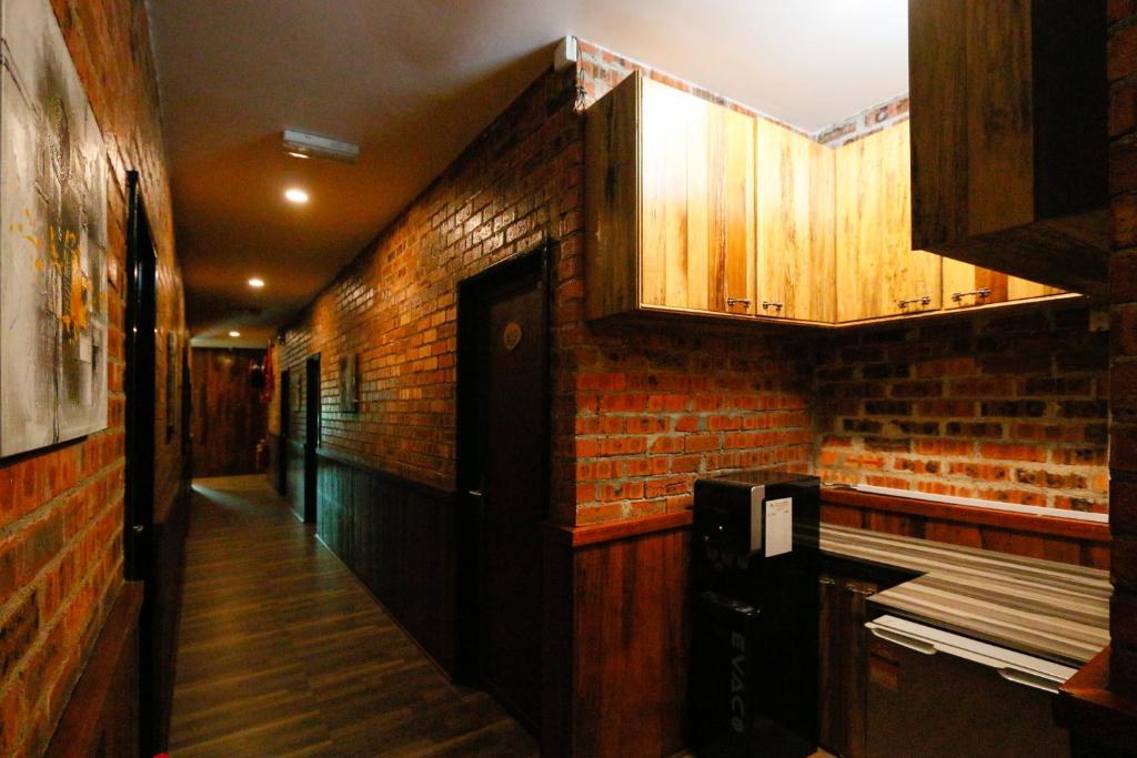 Kuchyň nebo kuchyňský kout v ubytování Anggun Hotel