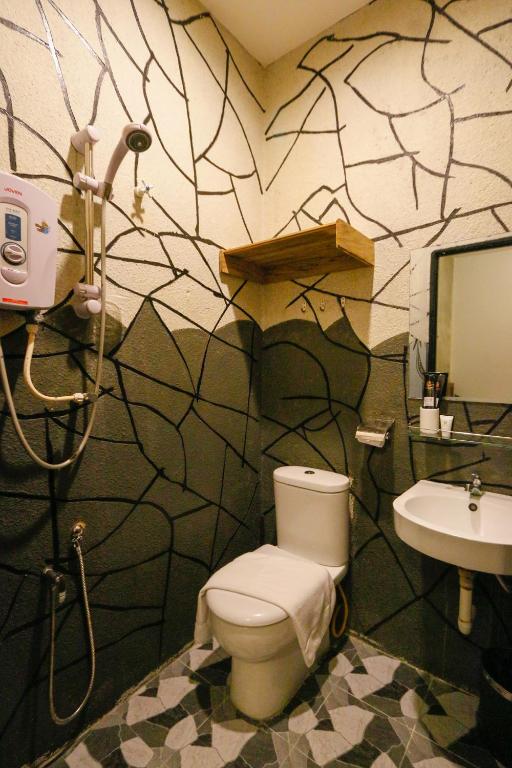 Koupelna v ubytování Anggun Hotel