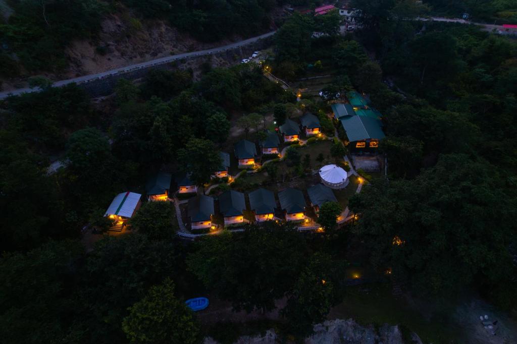 an overhead view of a house with lights at Banyan By The Ganges in Devaprayāg