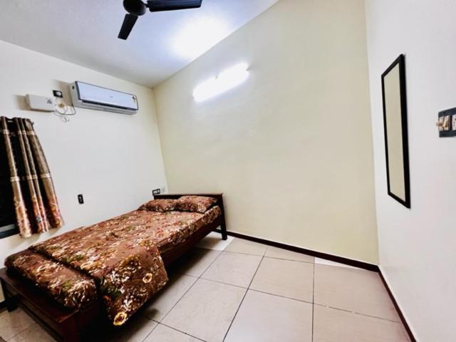 Postel nebo postele na pokoji v ubytování Lumina Home Stay