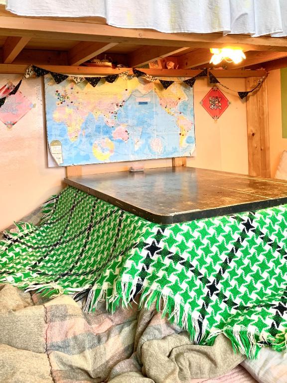 Postel nebo postele na pokoji v ubytování Otohaya Guesthouse