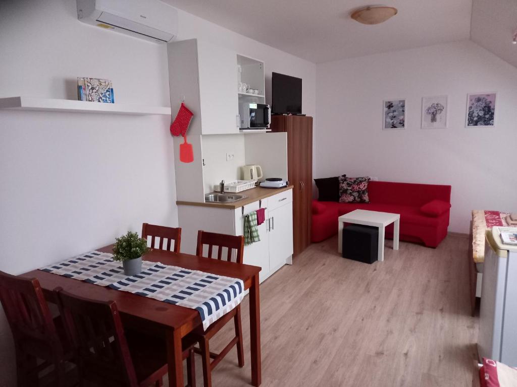 Posezení v ubytování Alegria Natur Apartments