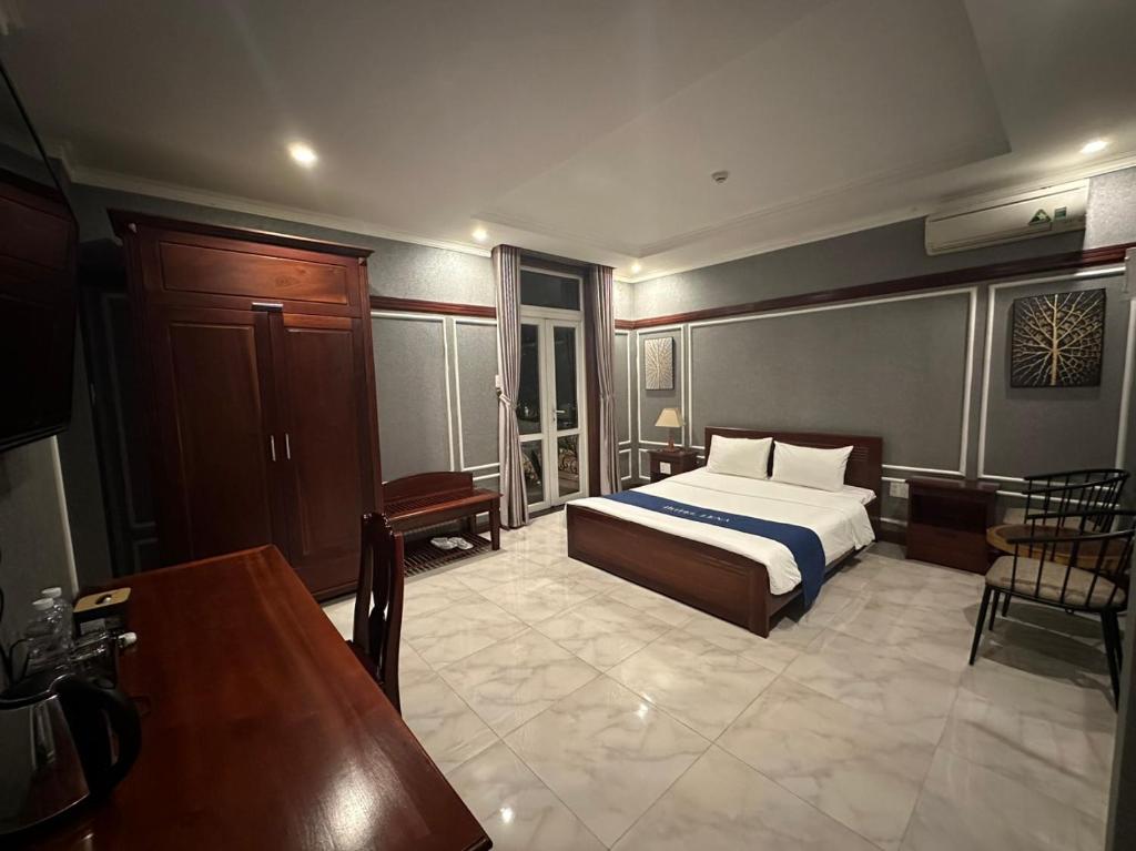 Postel nebo postele na pokoji v ubytování LENA HOTEL
