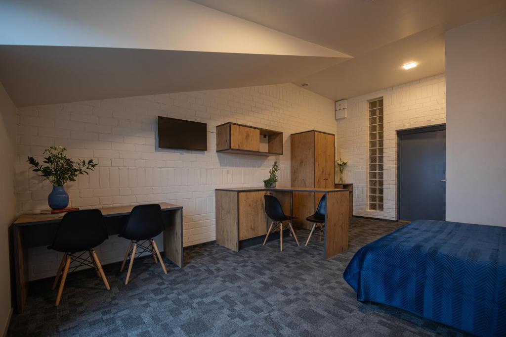 Kuchyň nebo kuchyňský kout v ubytování Loft Inn SELF-CHECK IN