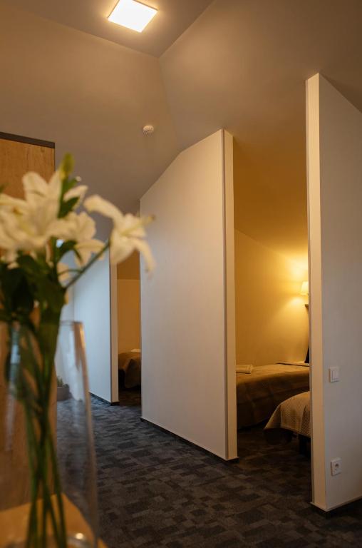 Postel nebo postele na pokoji v ubytování Loft Inn SELF-CHECK IN