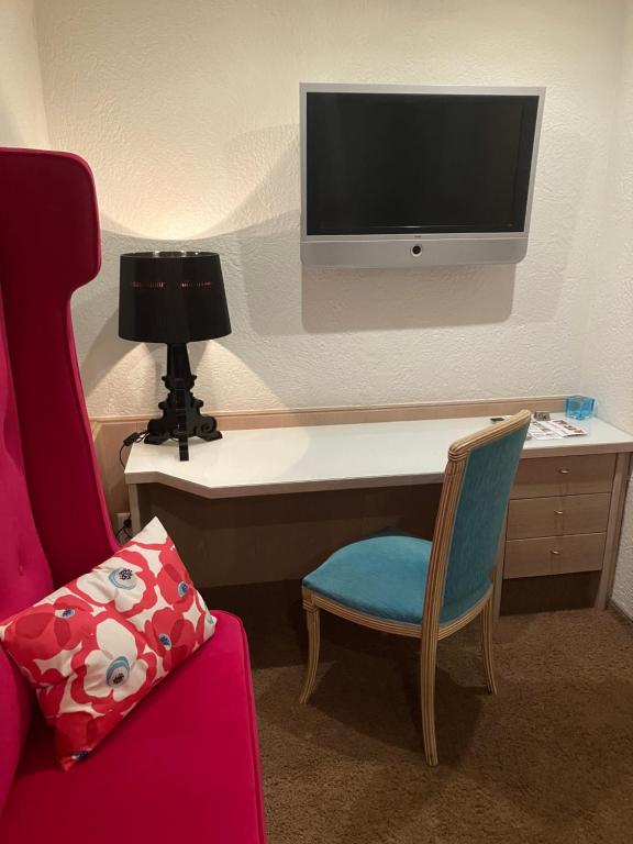 TV a/nebo společenská místnost v ubytování Hotel Kolb