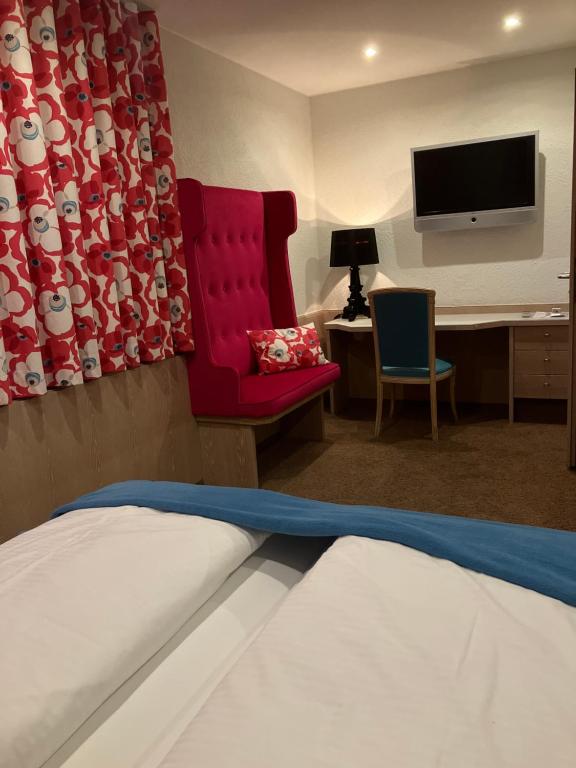 Postel nebo postele na pokoji v ubytování Hotel Kolb