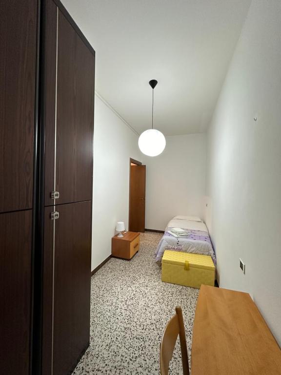 Postel nebo postele na pokoji v ubytování B&B Orchidea Bianca