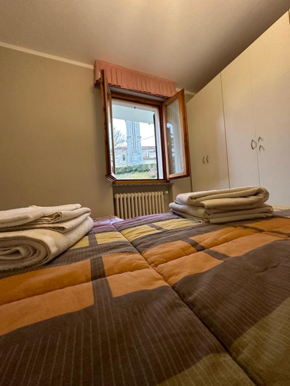 Postel nebo postele na pokoji v ubytování B&B Orchidea Bianca