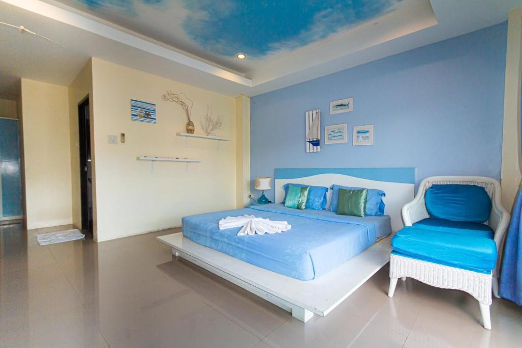 Postel nebo postele na pokoji v ubytování KRABI MORE HOTEL