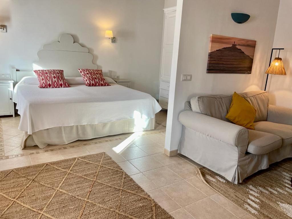 Postel nebo postele na pokoji v ubytování PETIT HOTEL ALGAIDA