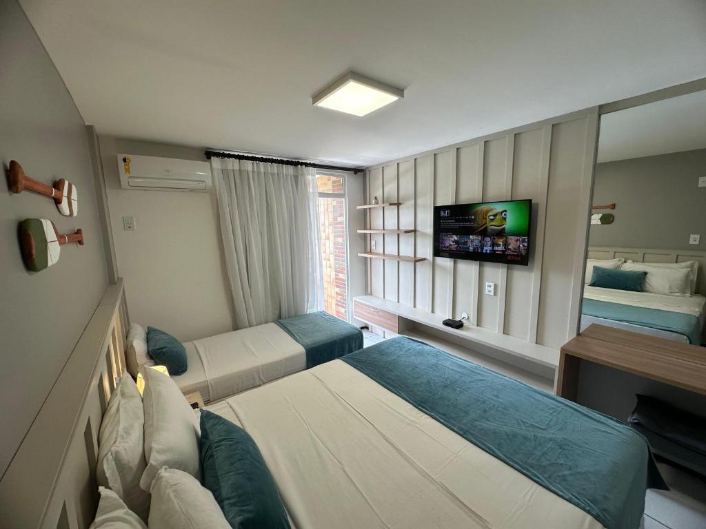 Postel nebo postele na pokoji v ubytování Gran Lençois Flat