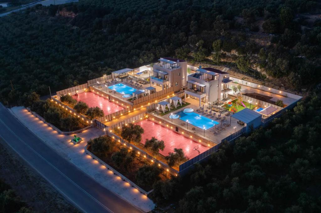 an overhead view of a large building with lights at Luxurious villa Micha Mare - 14 Bedrooms in Roumelí