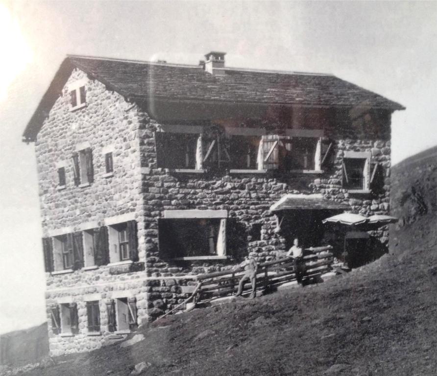 an old stone house on top of a hill at Hillary Hotel in Les Menuires