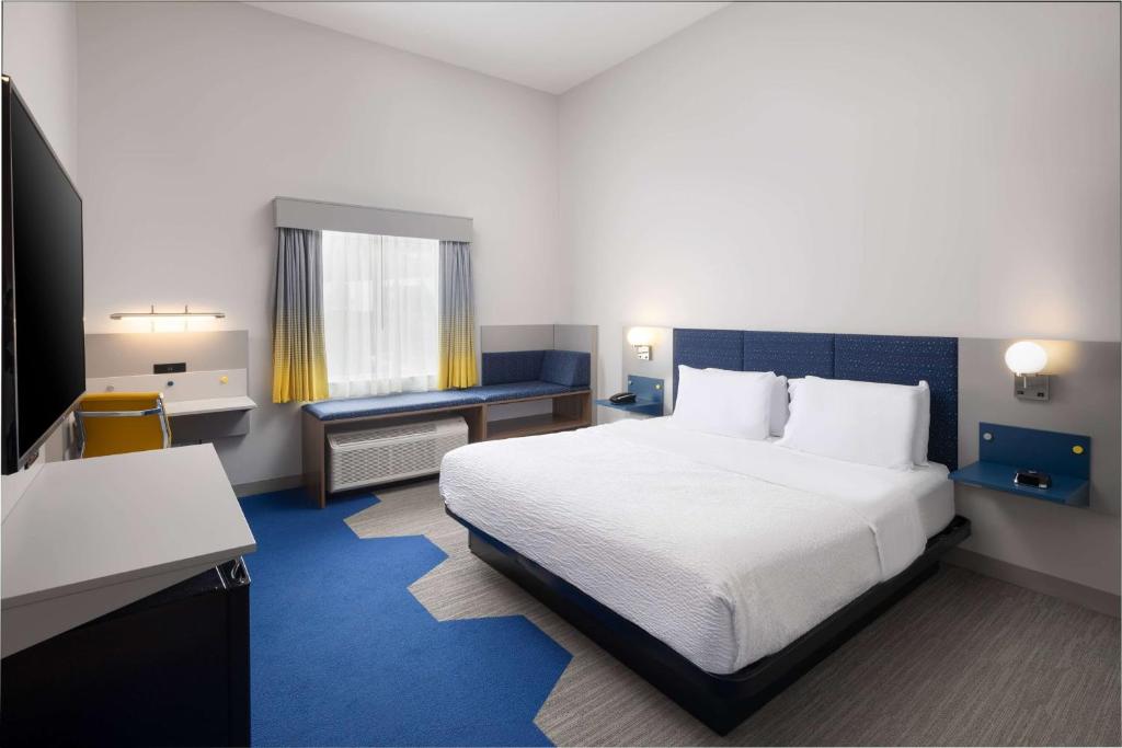 Postel nebo postele na pokoji v ubytování Microtel Inn & Suites by Wyndham Macedon