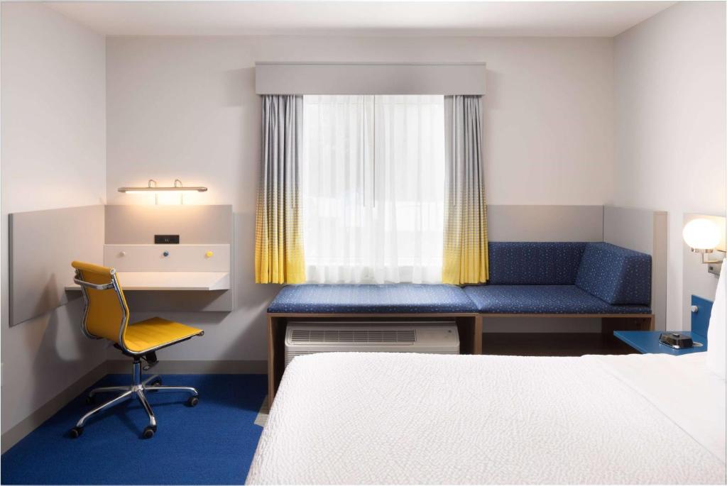 Postel nebo postele na pokoji v ubytování Microtel Inn & Suites by Wyndham Macedon