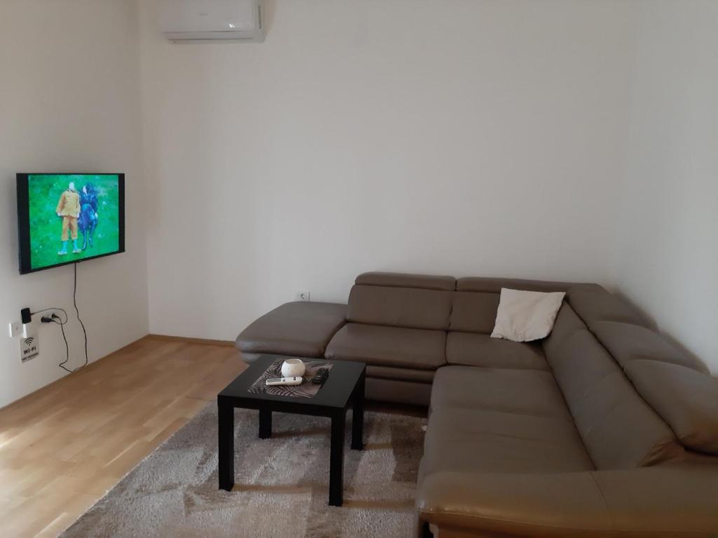 Apartman Podgoricaにあるシーティングエリア
