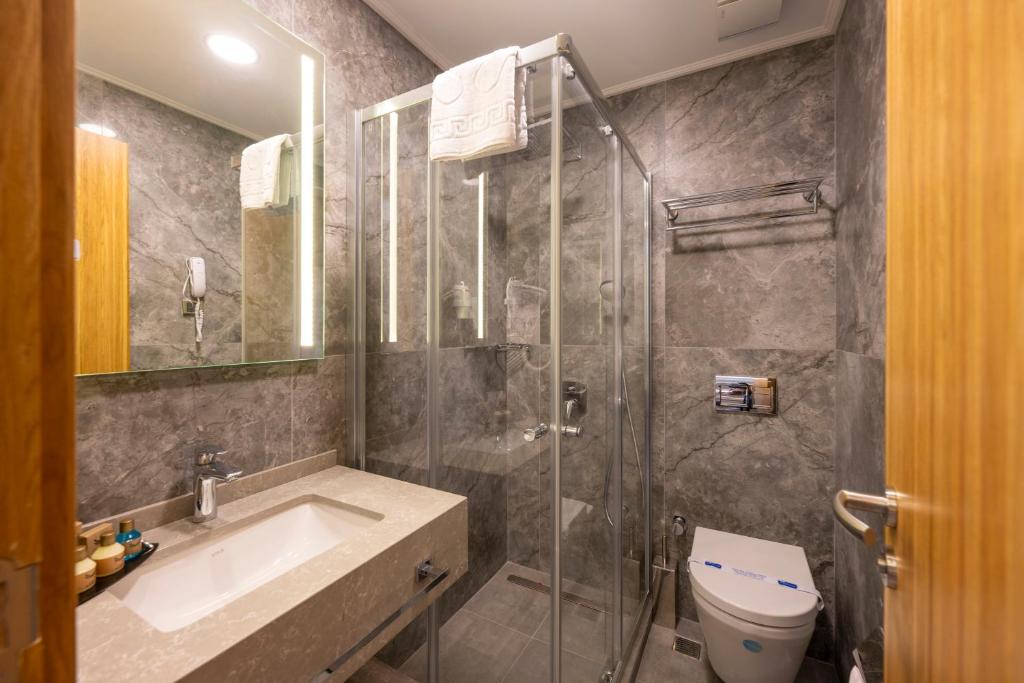 Koupelna v ubytování Hotel Ravi