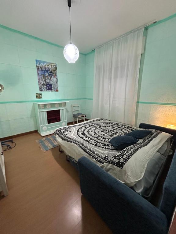A bed or beds in a room at La casa di Carla