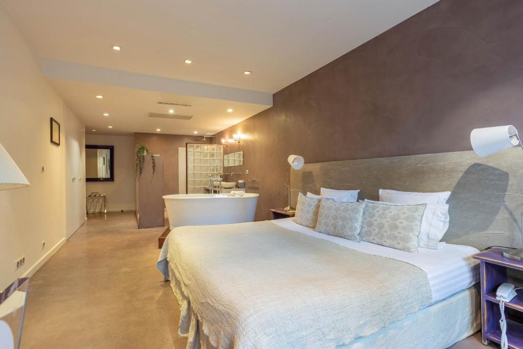 Postel nebo postele na pokoji v ubytování Hôtel Côté Sable