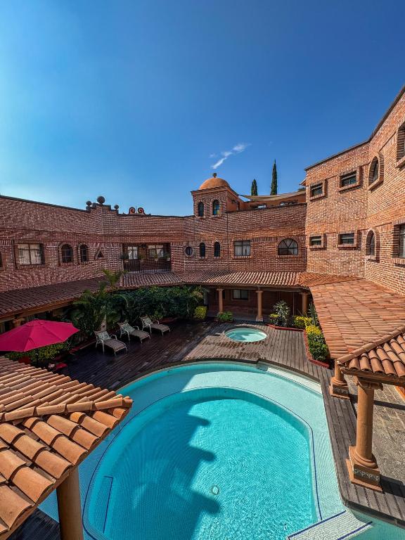 Bazén v ubytování Suites Paraiso Tequis nebo v jeho okolí