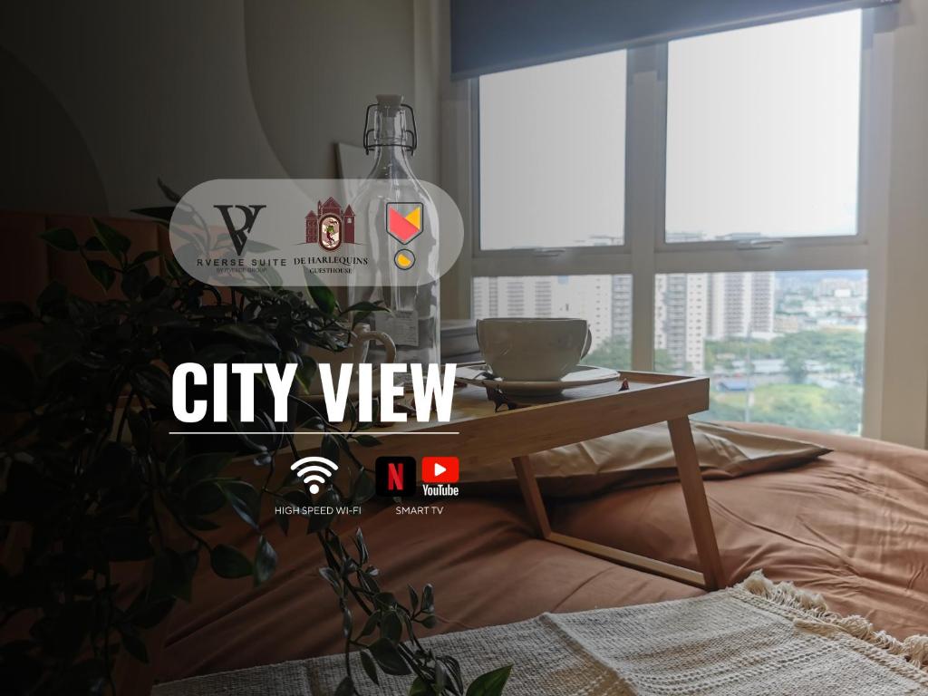 a city view homepage with a coffee table in a bedroom at Una Serviced Apartment, Jalan Peel in Kuala Lumpur
