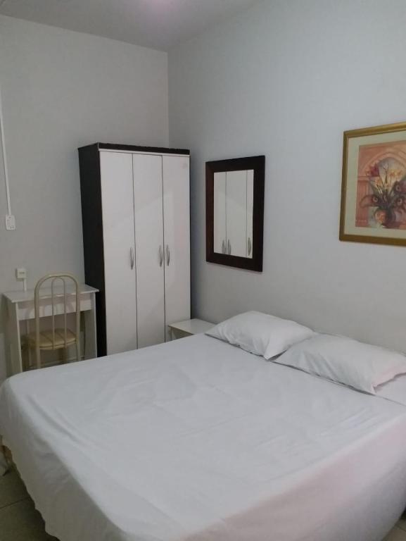Postel nebo postele na pokoji v ubytování Hotel Confort Maringá