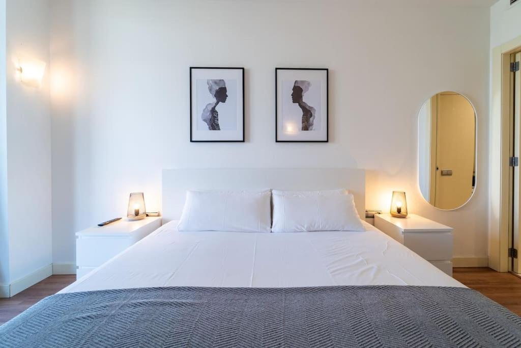 Posteľ alebo postele v izbe v ubytovaní Unique Rentals-Seafront Luxe Suites