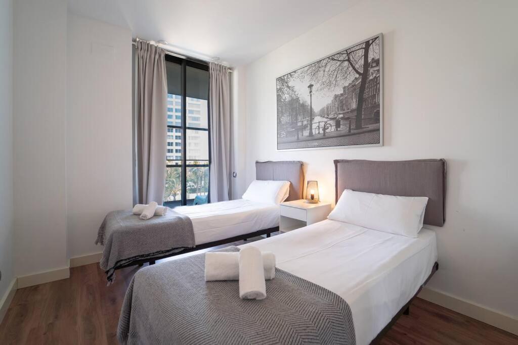 Posteľ alebo postele v izbe v ubytovaní Unique Rentals-Seafront Luxe Suites