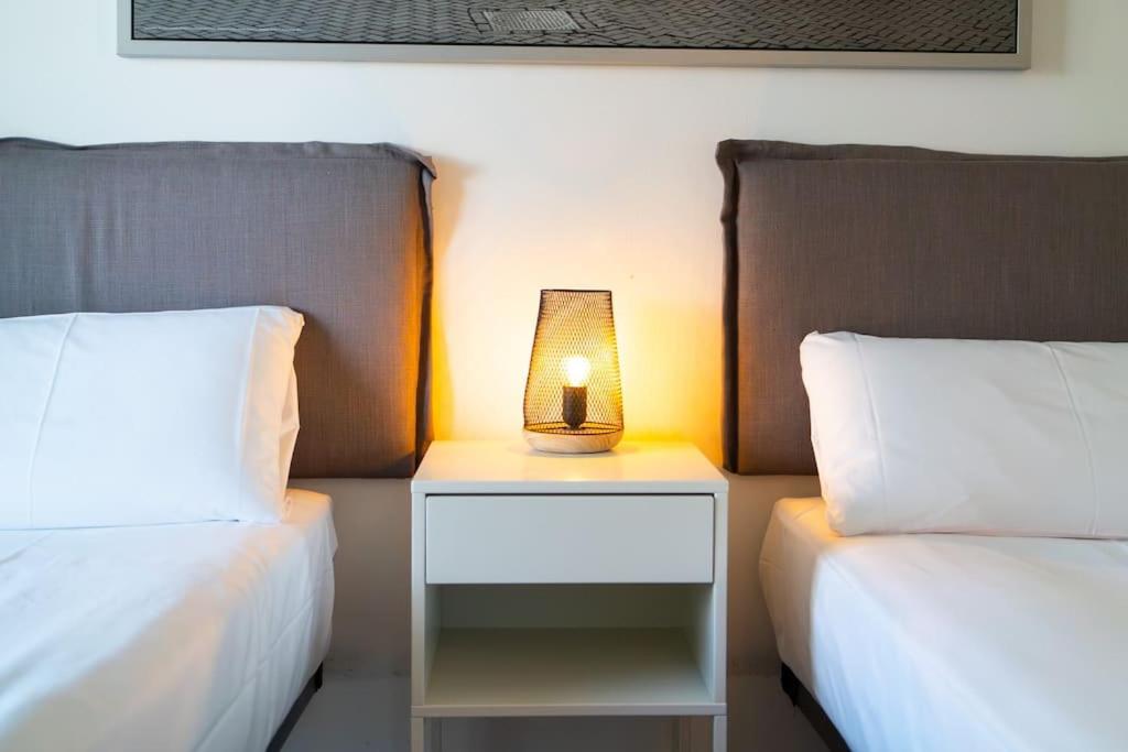 Posteľ alebo postele v izbe v ubytovaní Unique Rentals-Seafront Luxe Suites