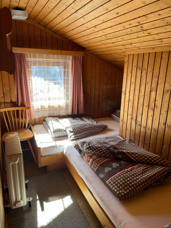 Posteľ alebo postele v izbe v ubytovaní Mühle in Görtschach