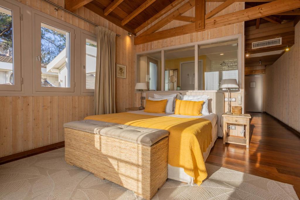 Postel nebo postele na pokoji v ubytování Hôtel Côté Sable