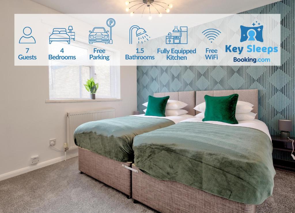 two beds in a bedroom with signs on the wall at Four Bedroom By Keysleeps Short Lets Peterborough With Free Parking Spacious Central Contractor in Peterborough