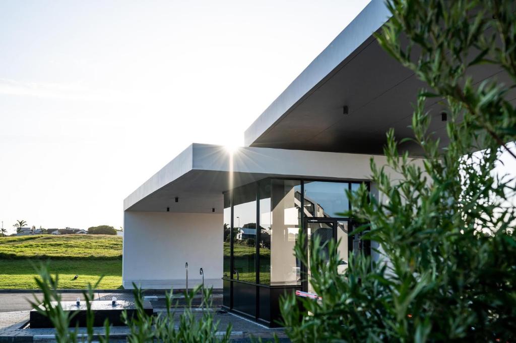 a modern house with a glass facade at Bellamare in Summerstrand