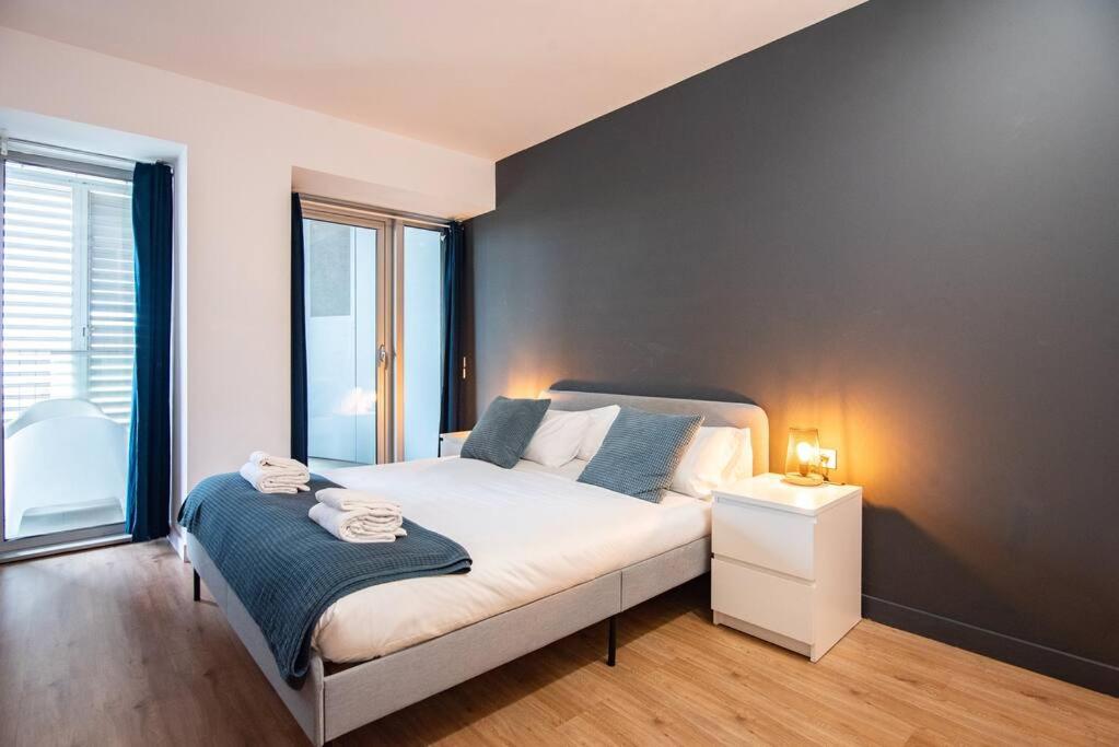 Posteľ alebo postele v izbe v ubytovaní Unique Rentals-Seafront Luxe Suites
