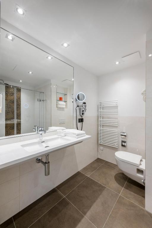 Koupelna v ubytování IMLAUER Hotel Nestroy Wien