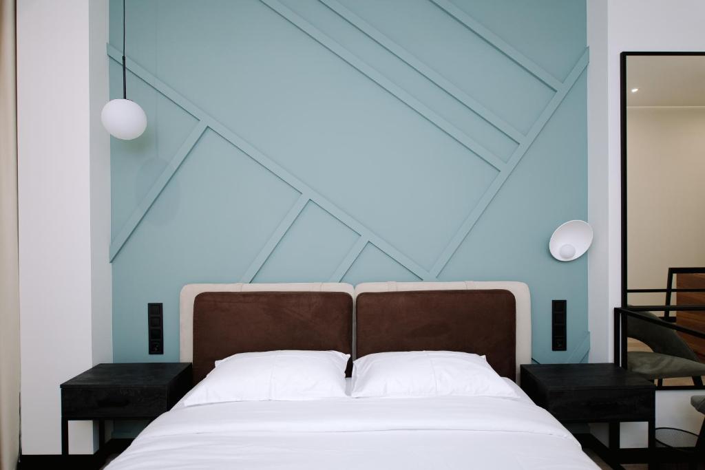 Postel nebo postele na pokoji v ubytování Select Hotel