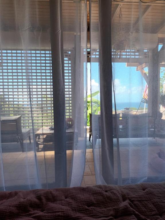Posezení v ubytování La Vista, chambre d'hôte chez l'habitant