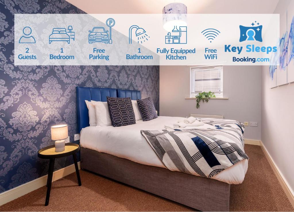 a bedroom with a bed and a wall with logos at One Bedroom Apartment At Keysleeps Short Lets Central Location Leisure Contractor Free Parking in Hull