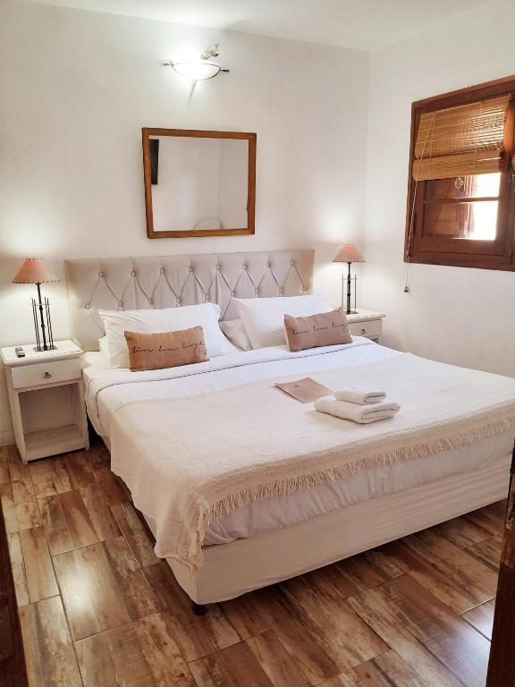 Postel nebo postele na pokoji v ubytování Rincón de Paz Apart & Loft Suite Boutique - Adults Only