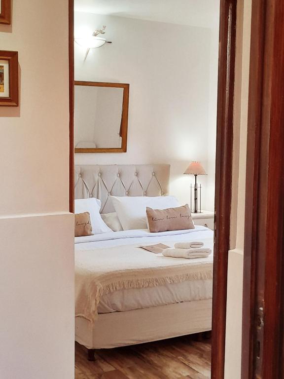 Postel nebo postele na pokoji v ubytování Rincón de Paz Apart & Loft Suite Boutique - Adults Only