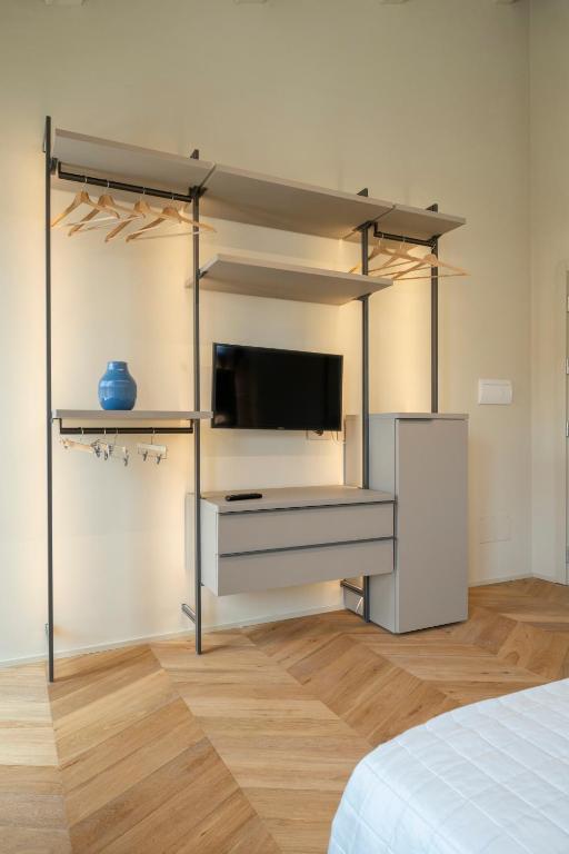 TV a/nebo společenská místnost v ubytování Marna Relais