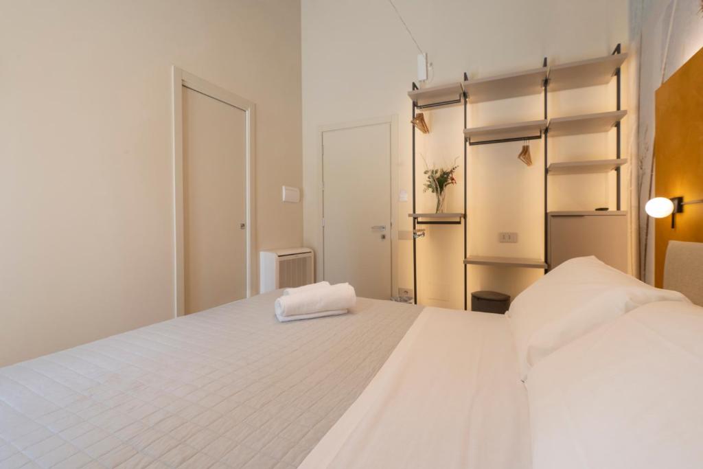 Postel nebo postele na pokoji v ubytování Marna Relais