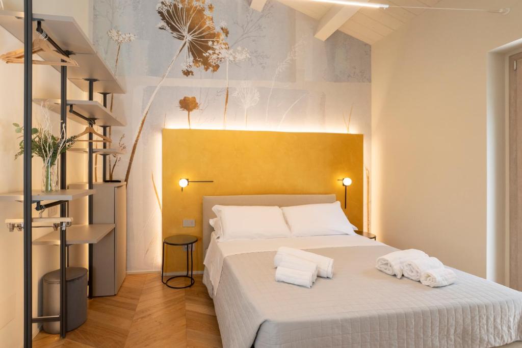 Postel nebo postele na pokoji v ubytování Marna Relais