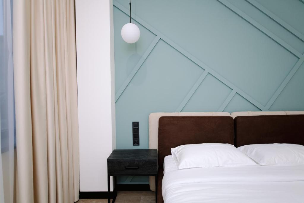 Postel nebo postele na pokoji v ubytování Select Hotel
