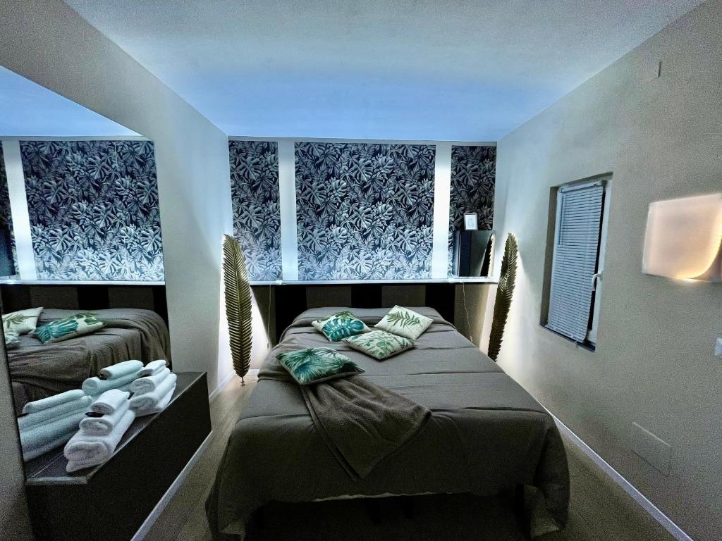 Postel nebo postele na pokoji v ubytování Villa San Donato B&B