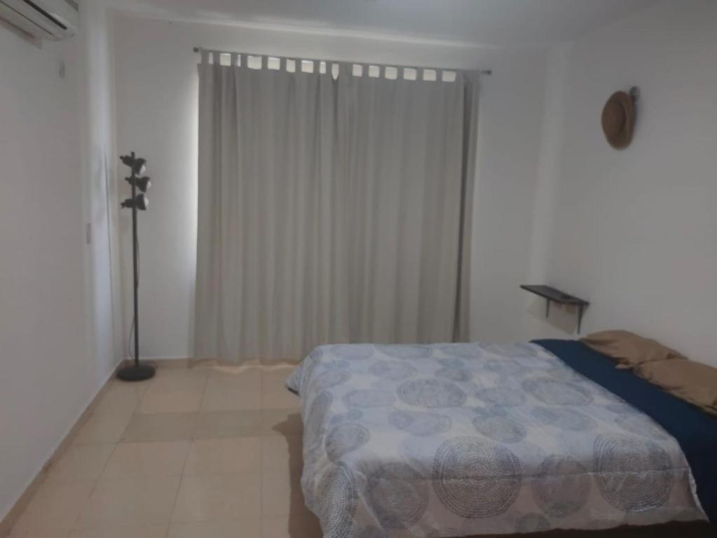 En eller flere senger på et rom på CASA CORAZA