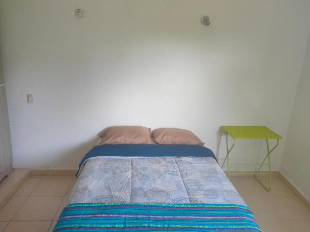 Postel nebo postele na pokoji v ubytování CASA CORAZA